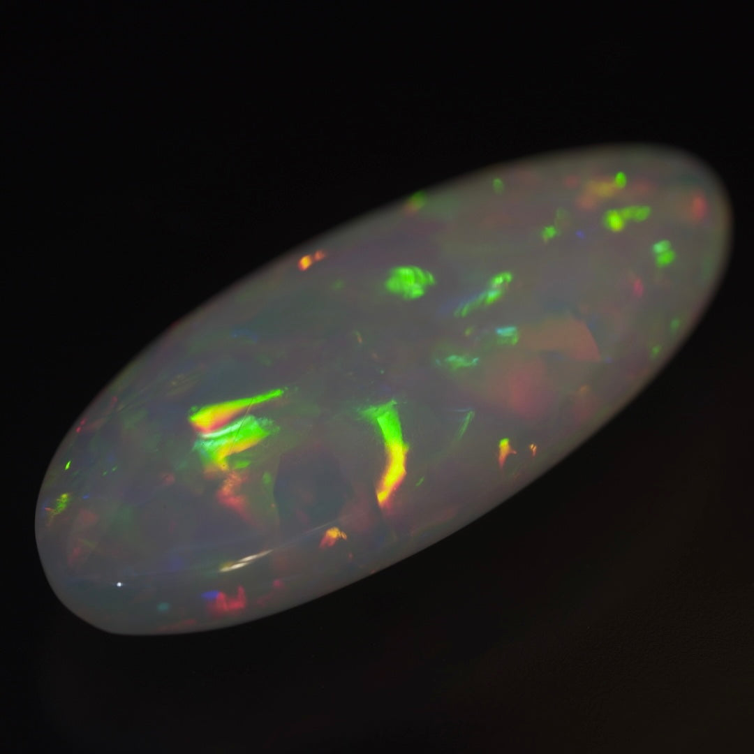 25.27 Karat, magische Regenbogenfarben, natürlicher äthiopischer Welo Opal - Excélsion Opal