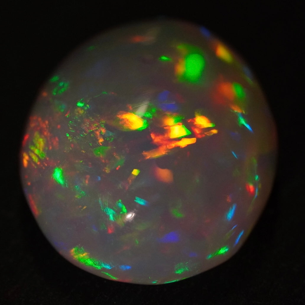 12.99 Karat, traumhafte Regenbogenfarben, natürlicher äthiopischer Welo-Opal - Excélsion Opal
