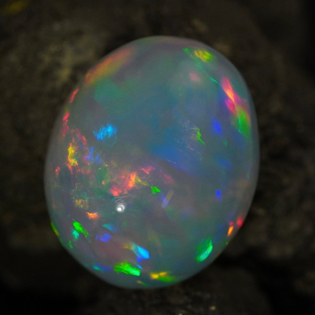 12.99 Karat, traumhafte Regenbogenfarben, natürlicher äthiopischer Welo-Opal - Excélsion Opal