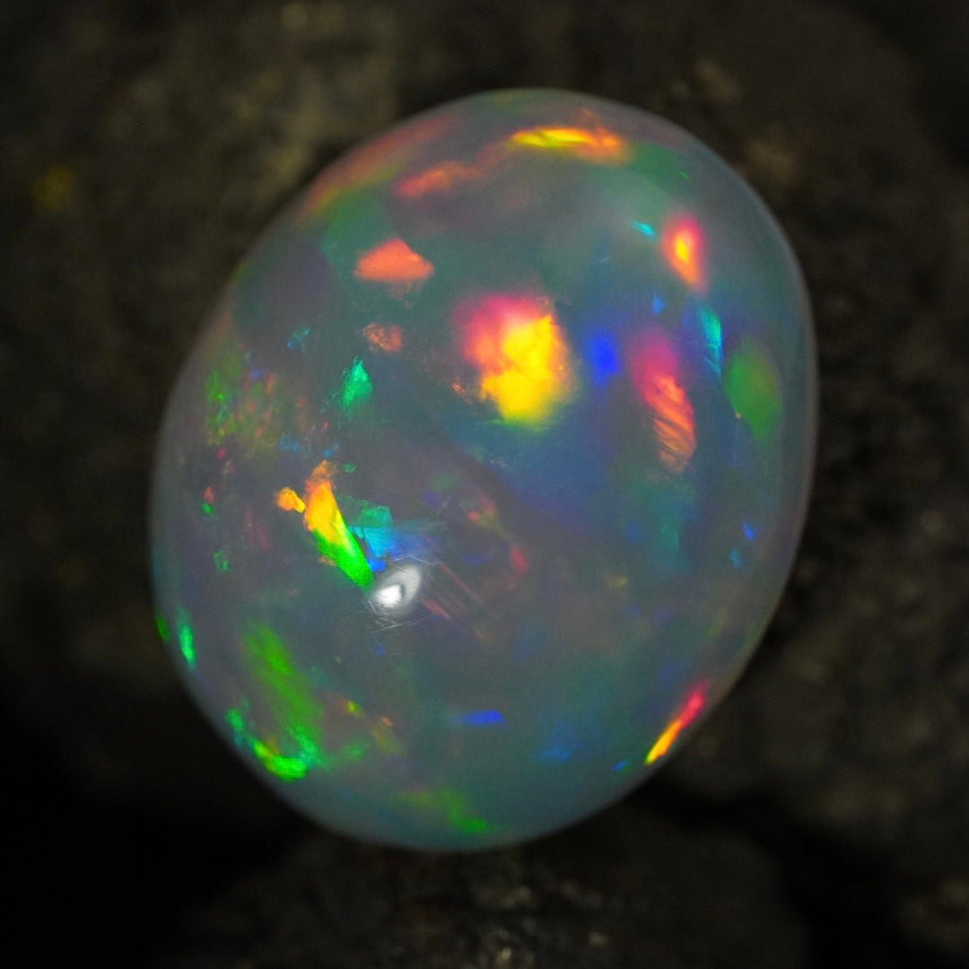 12.99 Karat, traumhafte Regenbogenfarben, natürlicher äthiopischer Welo-Opal - Excélsion Opal