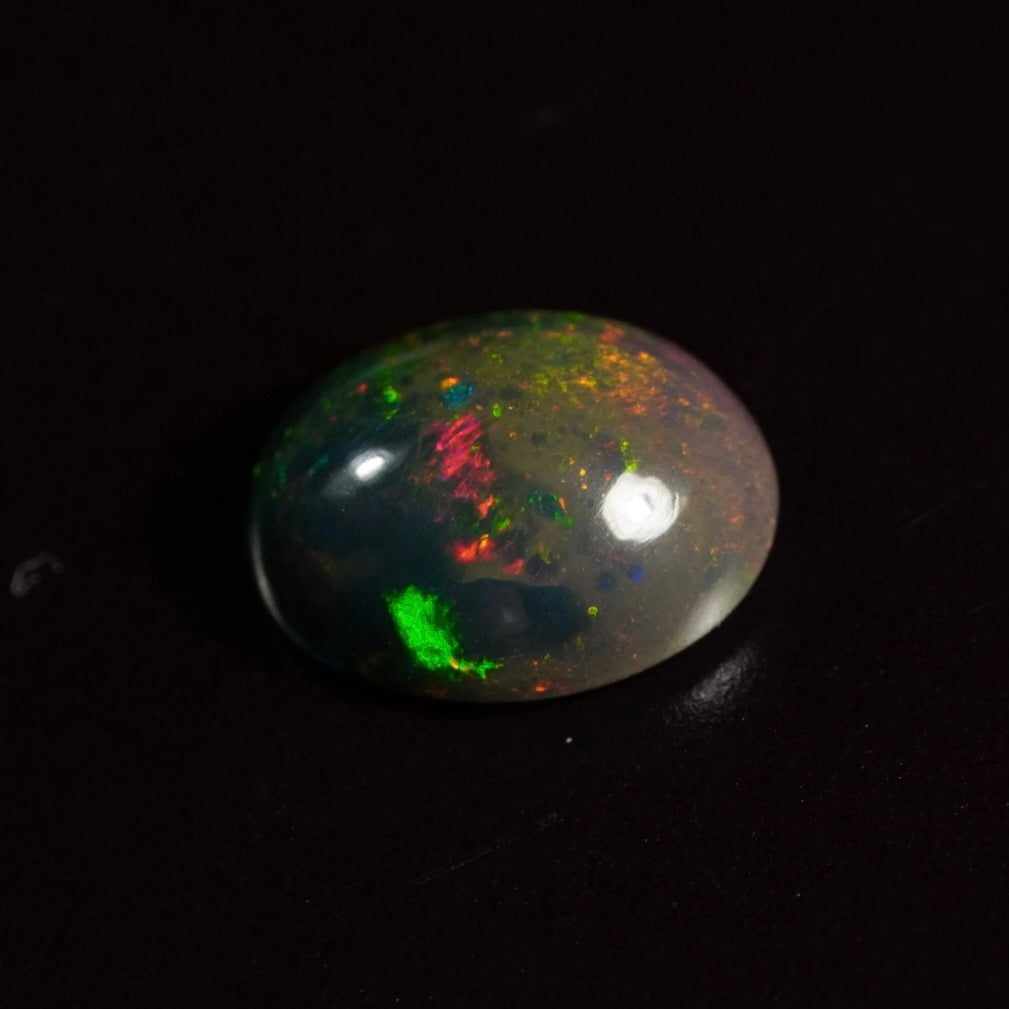 1.39 Karat wunderschönes Universum, dunkler Welo-Opal - Ténèbres Opal