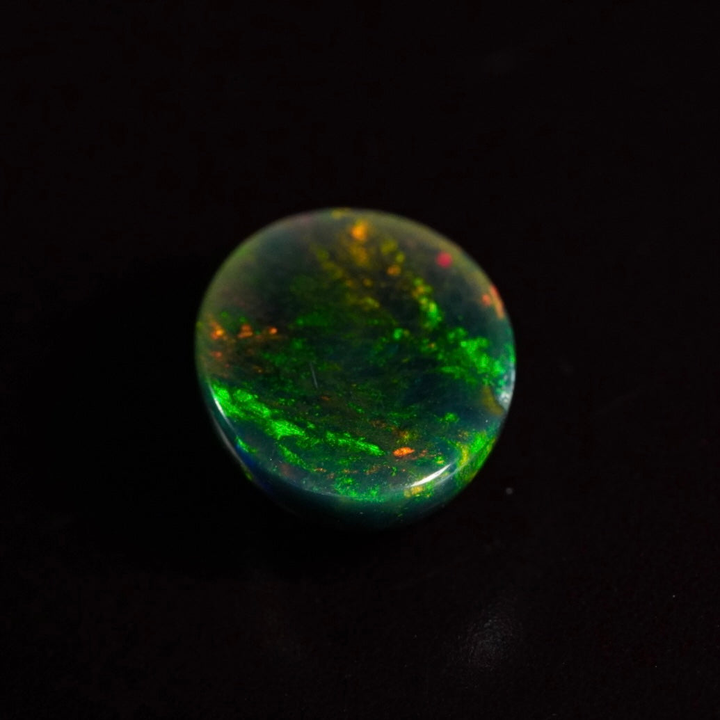 1.39 Karat wunderschönes Universum, dunkler Welo-Opal - Ténèbres Opal