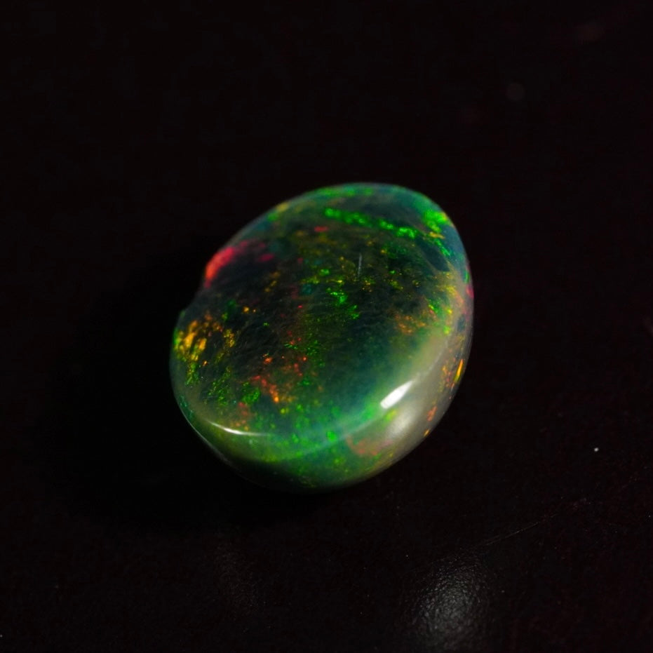 1.39 Karat wunderschönes Universum, dunkler Welo-Opal - Ténèbres Opal