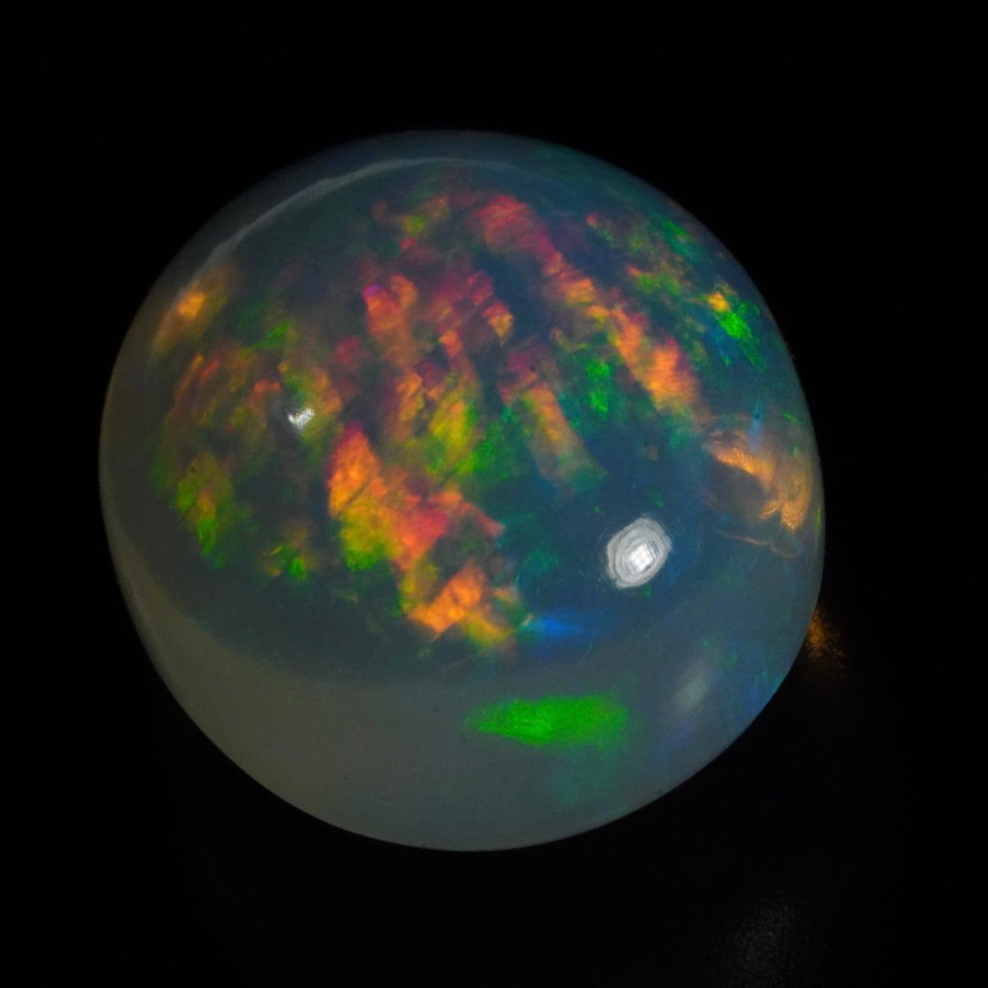 7.97 carat gorgeous galaxy pattern, Ethiopian Welo Opal - Éclaire Opal