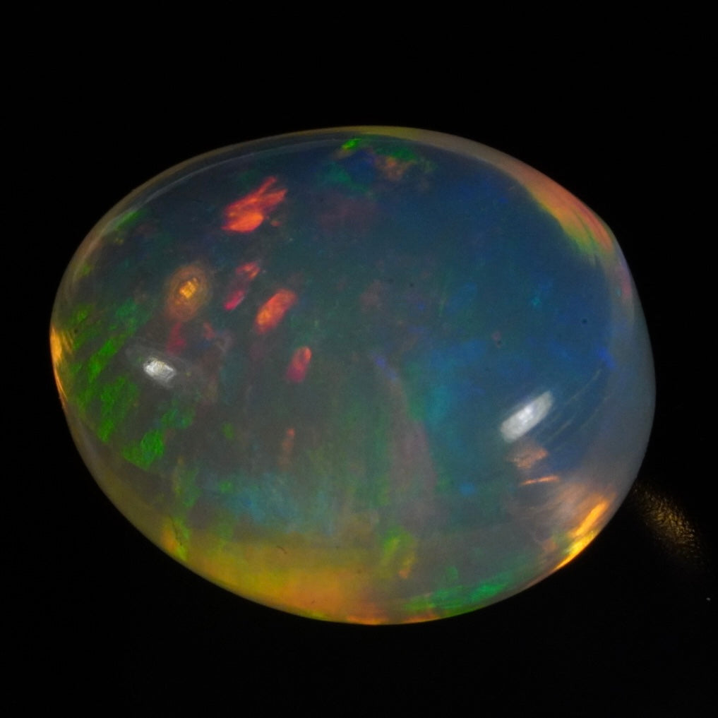 7.97 carat gorgeous galaxy pattern, Ethiopian Welo Opal - Éclaire Opal