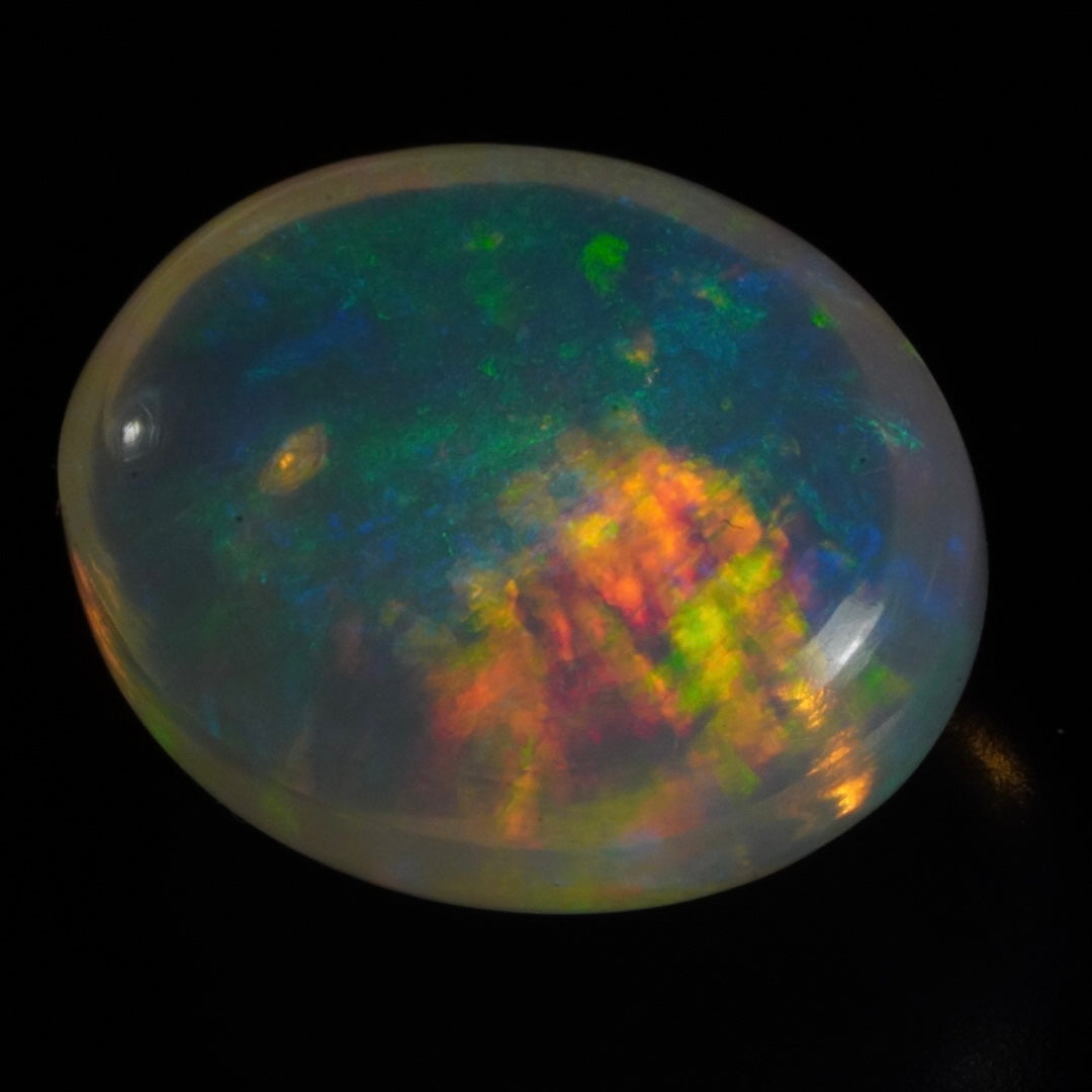 7.97 carat gorgeous galaxy pattern, Ethiopian Welo Opal - Éclaire Opal