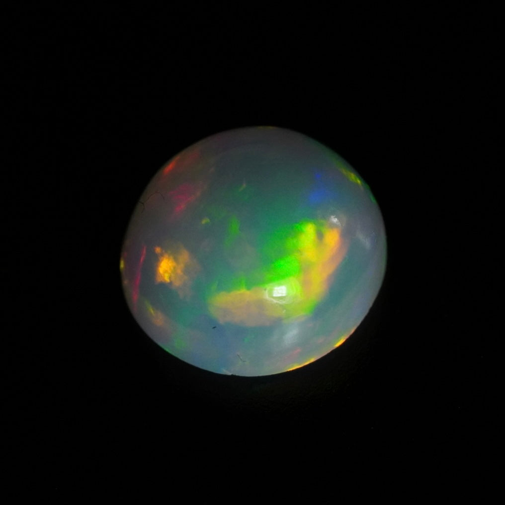 1.30 Karat traumhafter, runder weißer Welo-Opal - Juvénile Opal