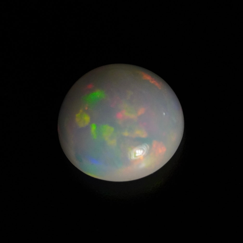 1.03 Karat wunderschöner, runder weißer Welo-Opal - Juvénile Opal