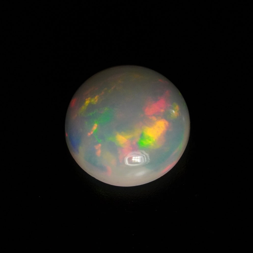1.03 Karat wunderschöner, runder weißer Welo-Opal - Juvénile Opal