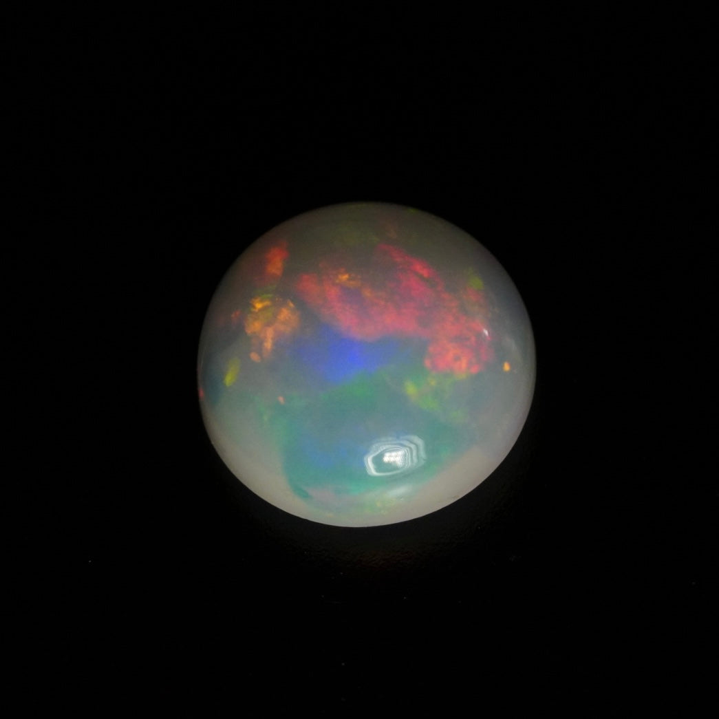 1.03 Karat wunderschöner, runder weißer Welo-Opal - Juvénile Opal